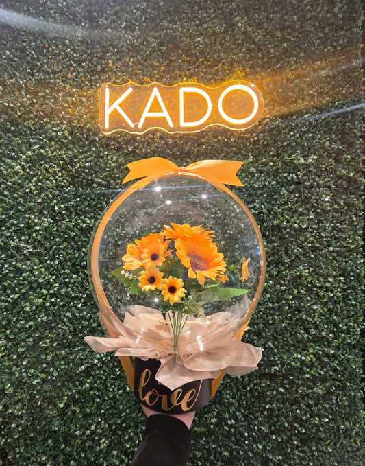Sunflower blooms in balloon
